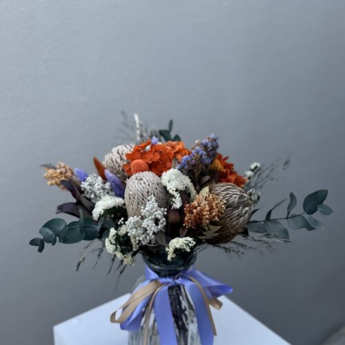 Rustic orange bunch in vase
